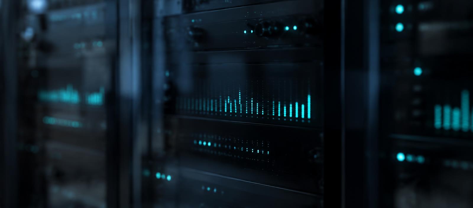 Networked audio equipment with teal indicator lights behind smoked glass